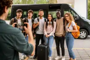 Pros and Cons of Solo vs Group Travel: What’s Right for You? 9 a group of young travelers on a tour